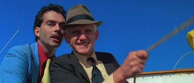 One of Australia's most recognizable character actors, David played hapless criminal Whitey (r), who, along with Mustache and The Boss, plans to make off with $1.5 million in a payroll heist.