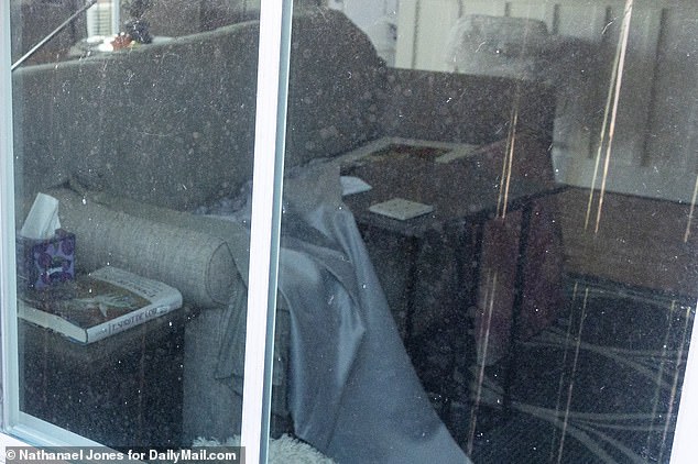 DailyMail.com exclusive photos show two-bedroom, two-bathroom property in complete disarray