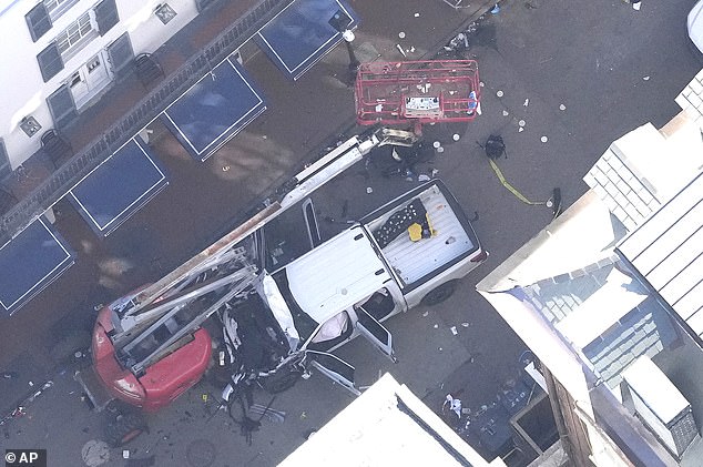 Investigators are working at the scene after a person drove a vehicle into a crowd at Canal and Bourbon Street in New Orleans on New Year's Day.