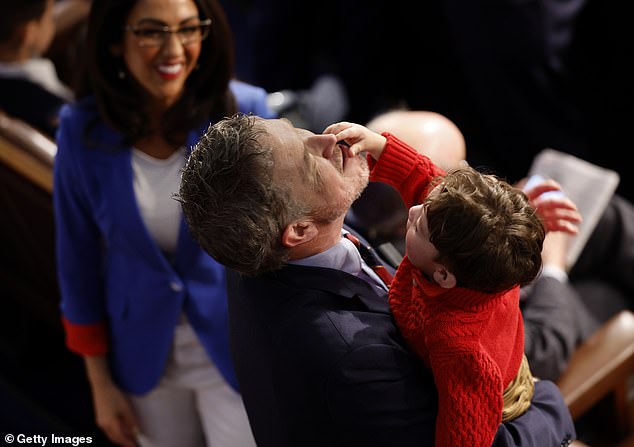 Massie held and played with Boebert's grandson for a while before voting took place