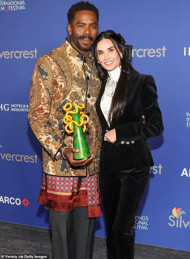 Moore and Colman Domingo were seen taking a memorable photo together after she presented the actor with the award.