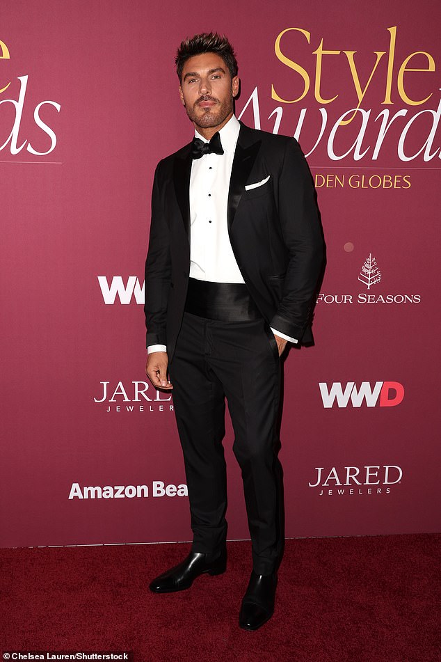 Chris Appleton looked elegant in a classic black tuxedo