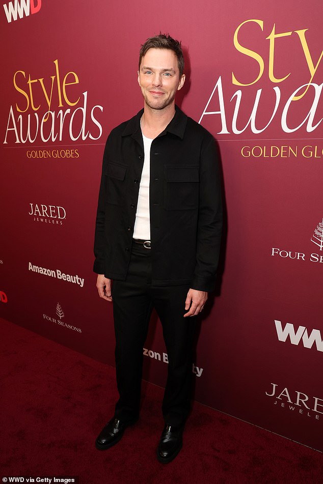 Nicolas paired a plain white t-shirt with a black jacket and pants.