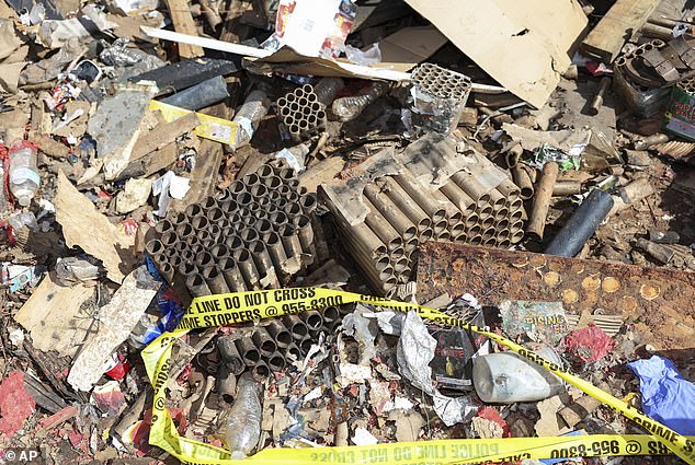 Fireworks debris is seen outside the home where a New Year's Eve fireworks explosion killed and injured people in Honolulu