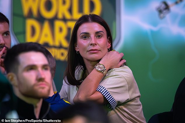 The I'm A Celebrity star opted for a chic beige T-shirt with blue and white striped trim, and the stunner teamed her top with a trendy gold watch and simple gold earrings.