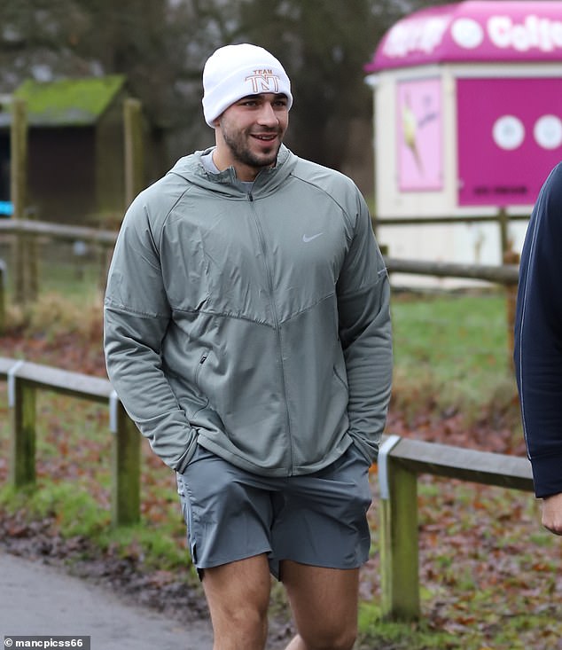 Tommy looked all smiles as he headed out for a run in Cheshire on Saturday.