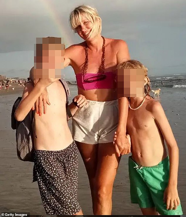 Jessie White, founder of the collapsed Shakuhachi fashion empire, has been living in Bali since her business spectacularly collapsed, leaving behind a trail of debt. She appears in the photo with her children.