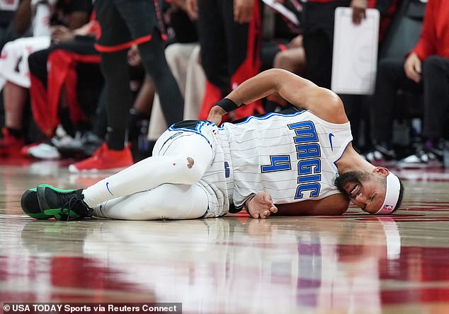 Suggs writhed on the floor in pain after his injury. His coach later said he appeared to be suffering from back spasms.