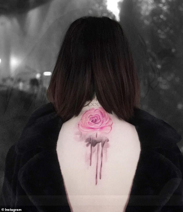 She also has a pink watercolor rose, which she got in 2021, inspired by her friend Cara Delevingne.