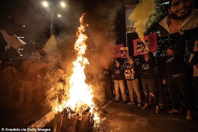 Anti-government protesters lit multiple bonfires this afternoon in the streets of Tel Aviv.