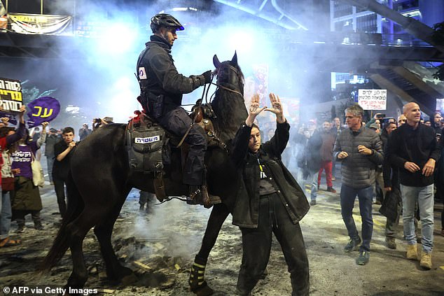 Officers on horseback could be seen pushing their way through the crowd of protesters.