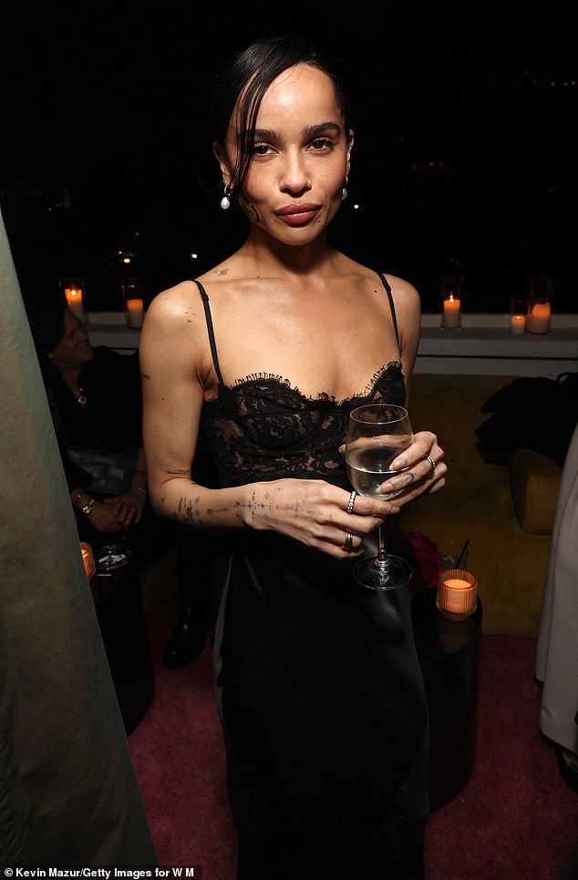 Zoe Kravitz, 36, also looked stunning in a black lace and silk dress as she enjoyed a glass of wine at the party after splitting from fiancé Channing Tatum.