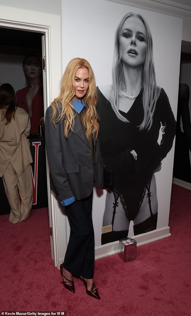 Baby Girl star Nicole radiated glamor in a royal blue blouse and oversized jacket, paired with delicate court heels.