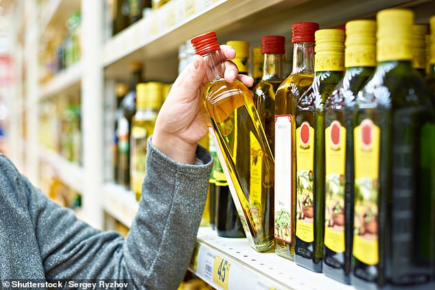 When purchasing olive oil, look for labels that provide additional information, such as the name of the producer, the variety of olive, or the exact region of cultivation (file image)