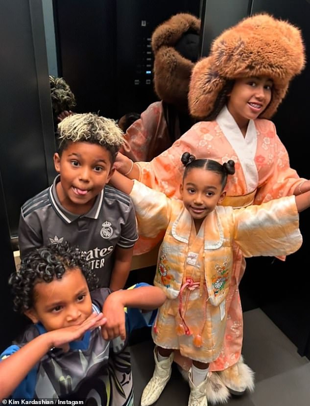 She also shared several snaps of her four children: North, 11, Saint, nine, Chicago, seven in January, and Psalm, five, who she shares with ex Kanye West.