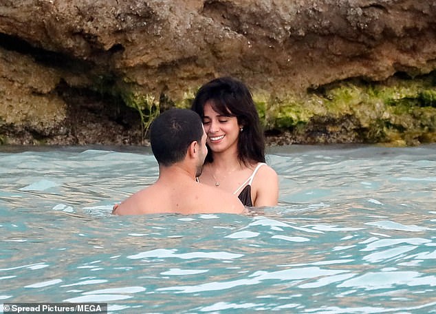 During their couple's trip, the Havana singer looked smitten as she looked adoringly at her new boyfriend