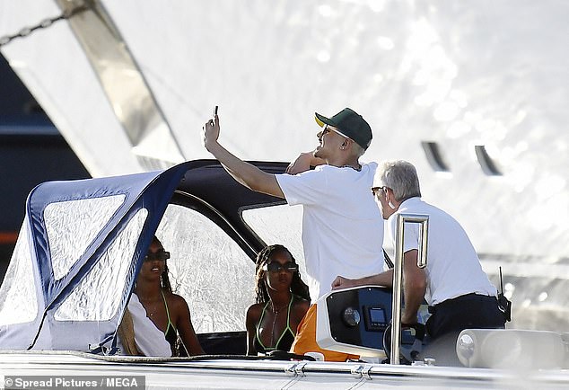 Their brother Quincy joined the twins on a luxurious yacht ride after lunch.