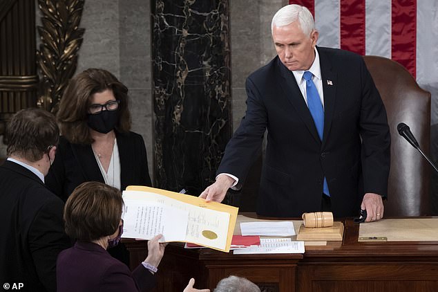 Vice President Mike Pence on January 6, 2021, while presiding over a joint session of Congress before lawmakers were evacuated when a mob attacked the Capitol. The session reconvened that same night to declare Joe Biden the winner of the 2020 election.