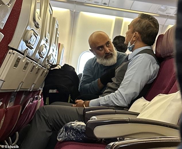 Arif (pictured left) prayed, sang and laughed before the plane took off from Sydney that afternoon, and the crew transported the 