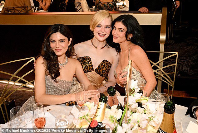 And with no pressure, Fanning was able to socialize with co-star Monica Barbaro (L) and Timothée's reality star girlfriend Kylie Jenner (R).