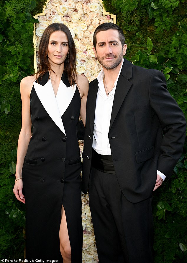 For the event, Gyllenhaal looked sharp in a black suit jacket and trousers with a satin waistband