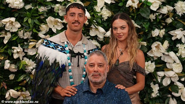 Dr. Brown photographed with his father, Mike Brown, and his partner, Caitlyn Wheeler.