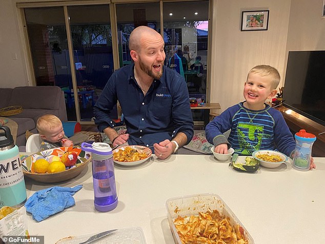 Vennix (pictured with his son and stepson) died after being swept out to sea by a strong current at Pasut beach.