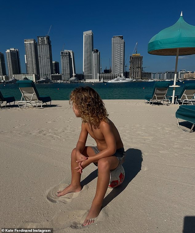 Cree was seen sitting on a soccer ball looking away from the camera in another image.