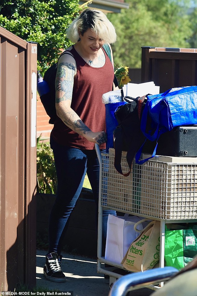 Showing off a new look and a macabre prison tattoo, the offender, now 32, walked out of the Bolwara Transition Center at Emu Plains Women's Prison at 9.30am on Monday.