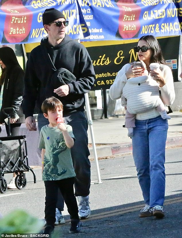 The couple looked relaxed as they wandered around the area with Callum, who will turn six in March, and Rhiannon, who is around six months old.