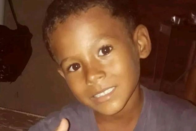 Eight-year-old Ulisses Gabriel da Silva lost his fight for life in November after almost three months in hospital. His seven-year-old brother Joao Miguel da Silva (above) had died on September 12.