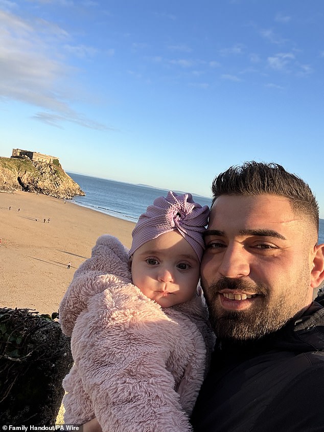 Six-month-old Sophia Kelemen in her father's arms. It is believed she was visiting the popular seaside town with her family and friends when she was hit by a Nissan Qashqai.