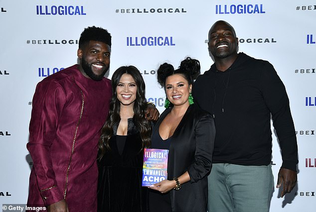 Taylor (second right) is pictured at the launch party for Emmanuel Acho's (left) 2022 book