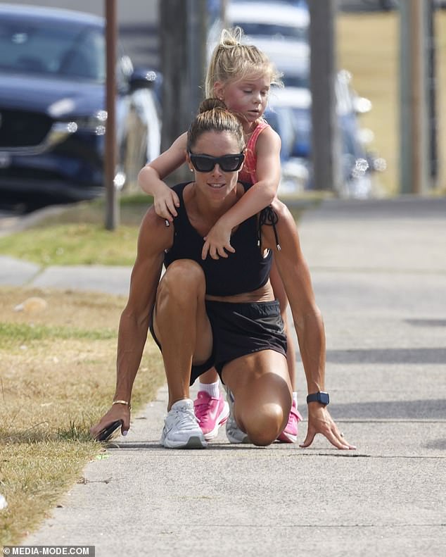 Candice was seen going for a run with her daughters, Ivy, 10, Indi, eight, and Isla, five, while they worked out near their home.