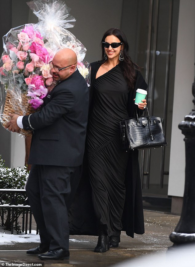 On Saturday, the Russian supermodel, 39, was showered with love from an unknown sender, who gifted her two stunning flower arrangements, including a huge bouquet of pink roses.