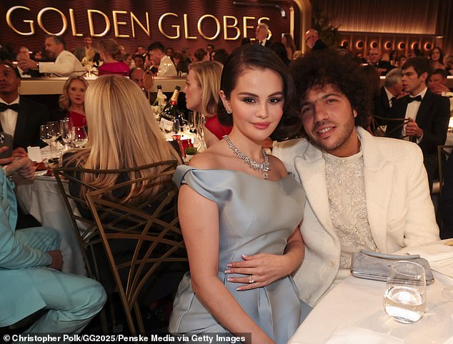 But Gomez had plenty of support in the form of her fiancé Benny Blanco (R), who Golden Globe host Nikki Glaser joked was only there because of the 