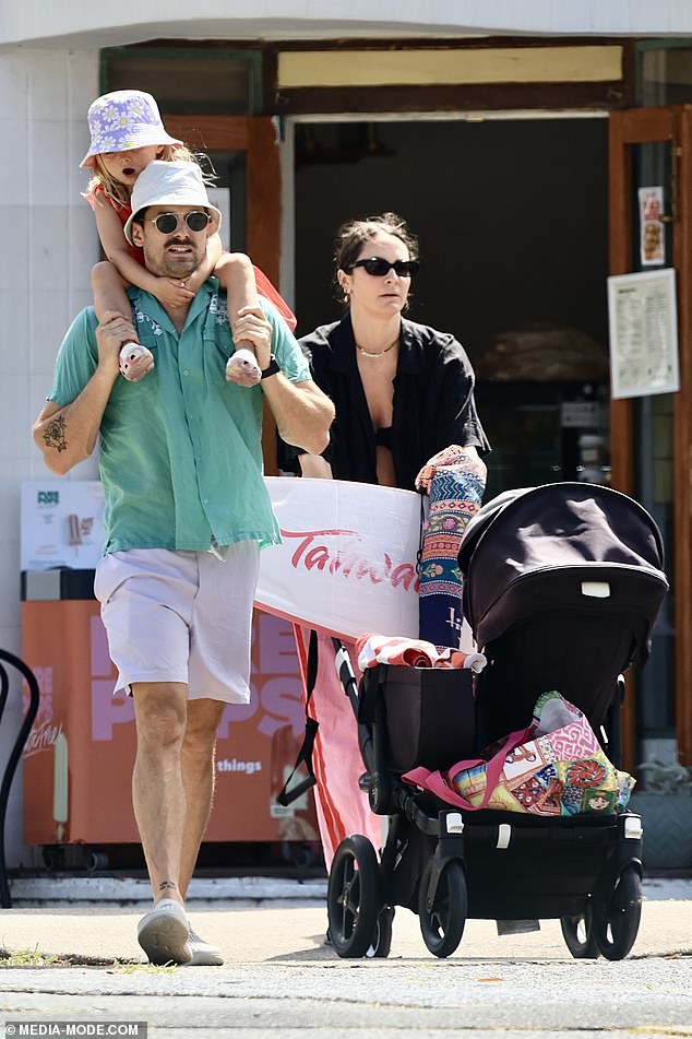 The radio presenter and her husband, Matty Johnson, took their two young daughters swimming at Bondi Beach on Sunday. Everything in the photo