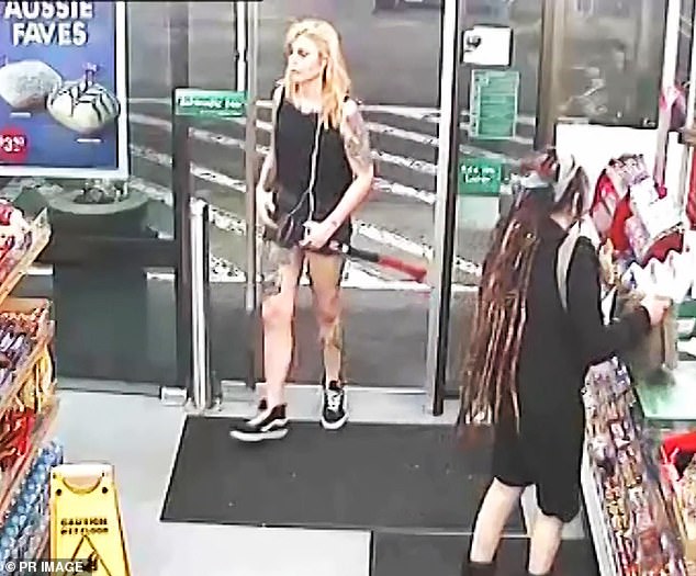 Sharon Hacker (right) at the register buying milk as Evie Amati enters with her ax and an 18cm knife in her back pocket, read to kill.