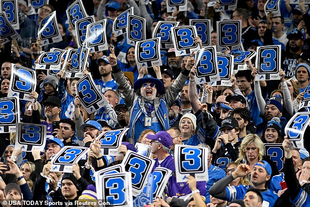 Detroit Lions fans riot on a third down play against the Minnesota Vikings in the first quarter at Ford Field on Sunday. By virtue of their win, the Lions now earn a first-round bye.