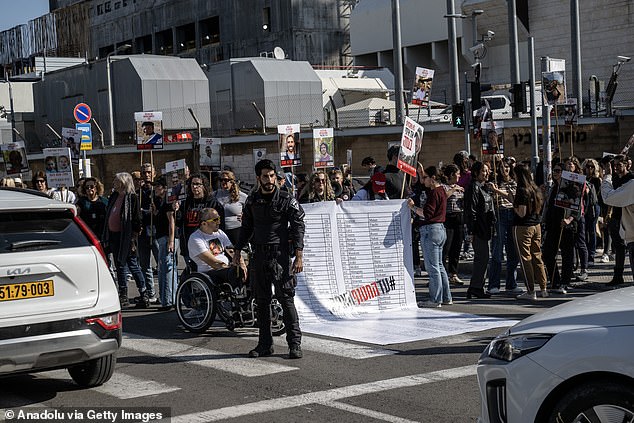 Relatives of Israeli hostages held in Gaza march in Tel Aviv for a ceasefire agreement on January 7, 2025.