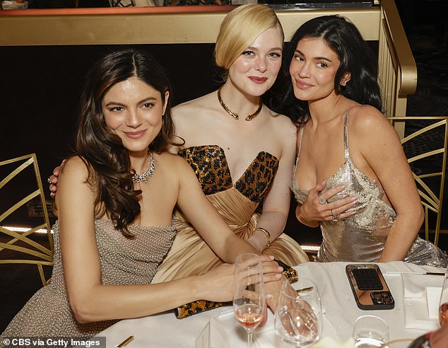 While at the event at The Beverly Hilton, the lip kit mogul could be seen mingling with Timothee's A Complete Unknown co-stars Monica Barbaro (left) and Elle Fanning (center).