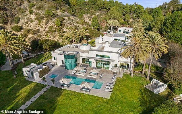 The luxurious home, which counts Adele and Justin Bieber as neighbors, has 11 bedrooms and 18 bathrooms.