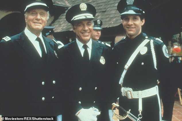 Guttenberg can be seen in 1985's Police Academy 2: Their First Assignment alongside Howard Hesseman (center) and George Gaynes (left)