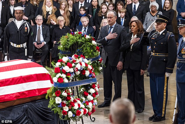 Vice President Kamala Harris and Second Gentleman Doug Emhoff pay their respects to former President Jimmy Carter in the Capitol Rotunda.