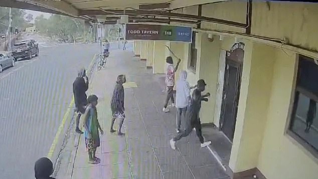 In recent years, crime rates have skyrocketed in Alice Springs. For example, in 2022, alcohol-related assaults increased by almost 70 percent (pictured: CCTV footage of youths attacking a local pub)