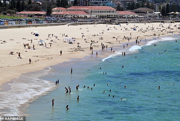 It comes after the state suffered a heatwave with temperatures ranging between 30 and 40 degrees (pictured, sunbathers at Bondi Beach).