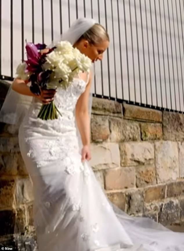 Another shot in the clip shows Jamie walking down a path in her tight-fitting wedding dress, only to rip the hem when it appeared to catch on something on the ground.