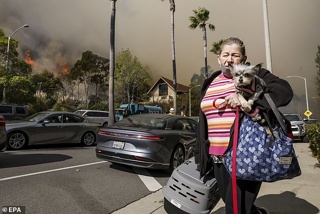 More than 30,000 people have now fled the city as California issues warn there is an 'imminent threat to life'