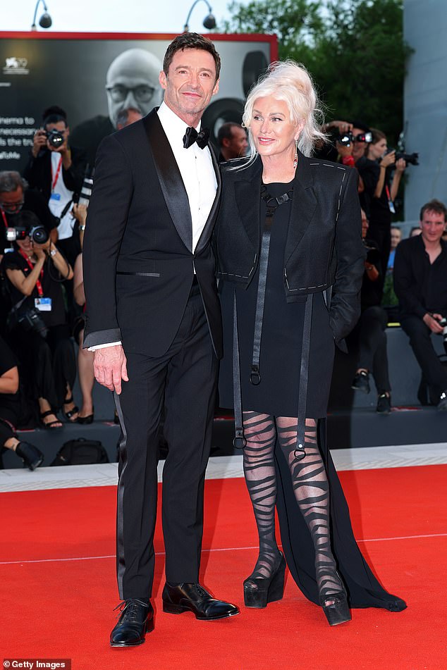 Sutton's glamorous choice of footwear was a far cry from Deborra's signature chunky pumps that she often wears during her red carpet appearances.