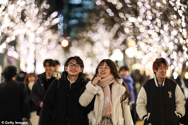 A young couple in Tokyo. Last year, the Tokyo metropolitan government even launched its own dating app to try to increase the birth rate. A Tokyo official described the move as a 